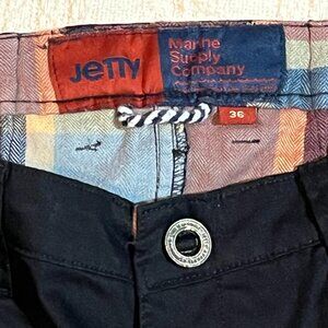 Jetty Marine Supply Co. Black with red plaid lined 36x30